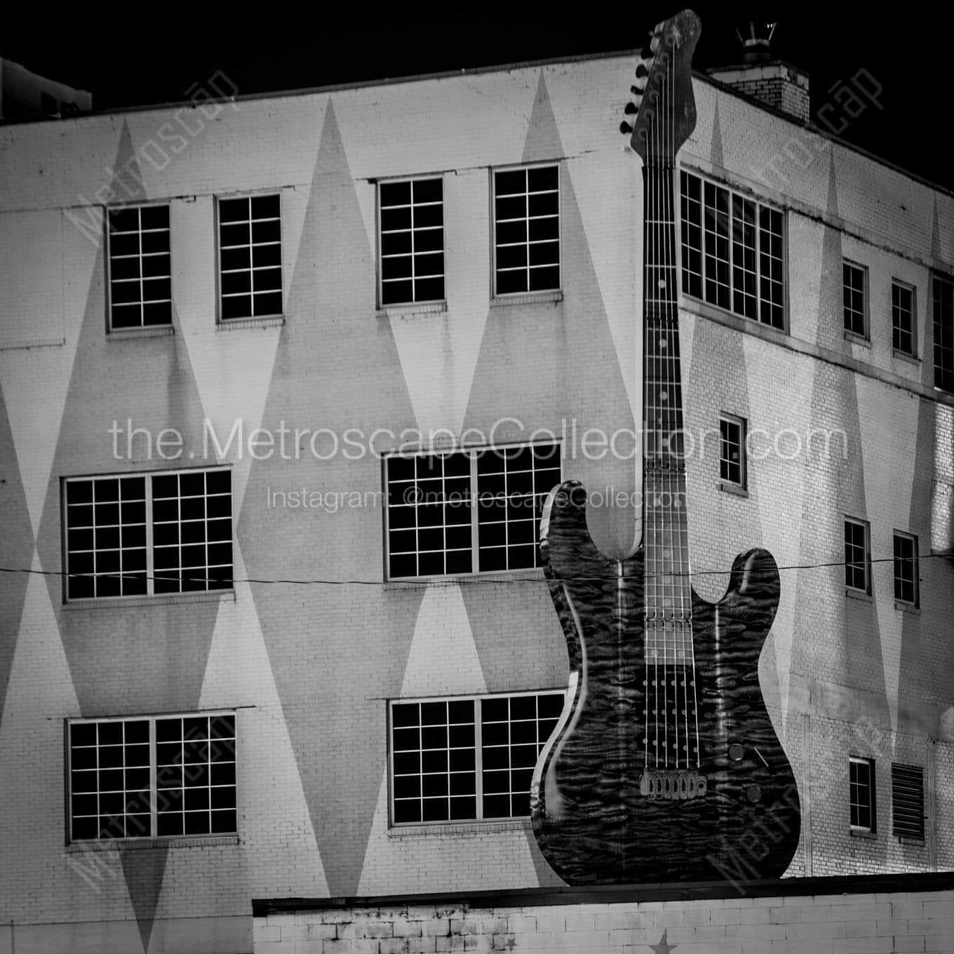 gibson guitar building at night Black & White Wall Art